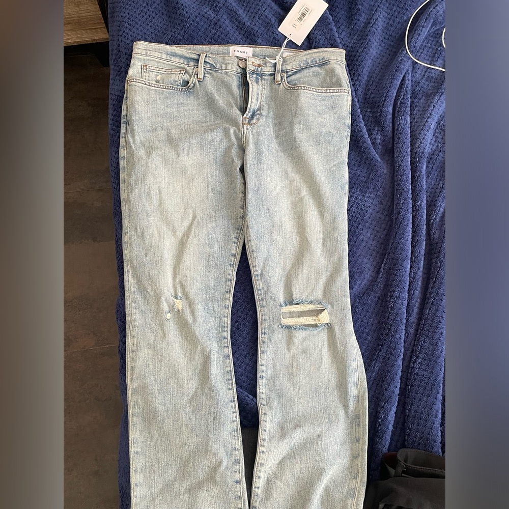 Brand new Frame L’Homme Skinny jeans with tag “Mid-Rise Skinny fit”